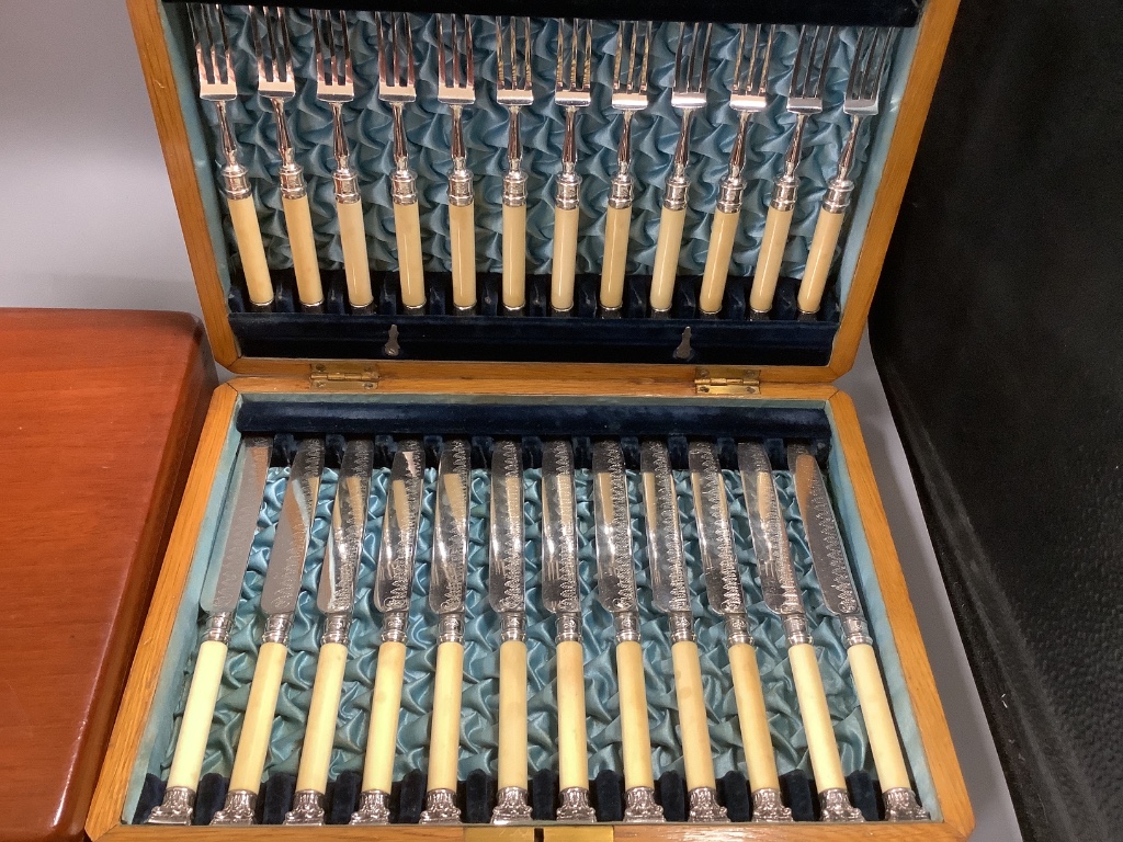 Assorted cased sets of plated flatware and cutlery including dessert knives and forks